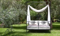 Relax in Villa Dinari's garden, your luxury villa in Marrakech