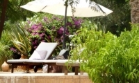 Pool-side parasol at your luxury villa in Marrakech